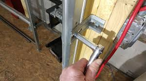 How To Fix Bottom Garage Door Roller Off Track