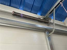 How Much Does A Garage Door Spring Replacement Cost