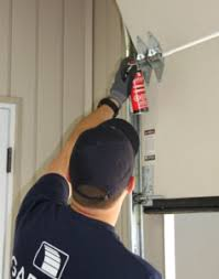 Garage Door Makes Loud Noise When Opening And Closing