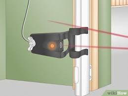 One Garage Door Sensor Is Orange And One Is Green