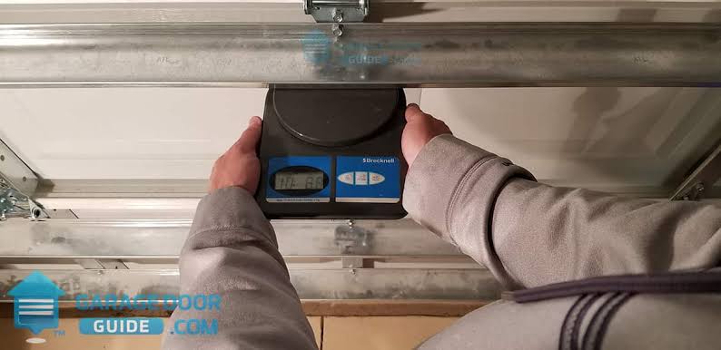 How Much Weight Can A Garage Door Opener Lift
