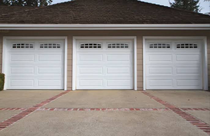 How To Minimize The Need For Garage Door Replacement