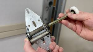 How To Put Garage Door Wheel Back On Track