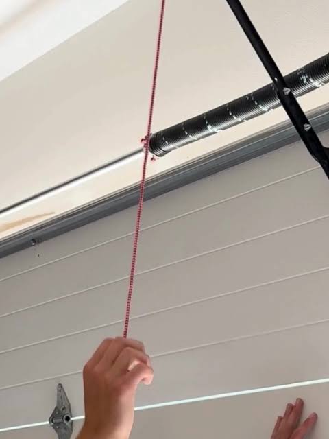 What Does The Red Cord Do On A Garage Door