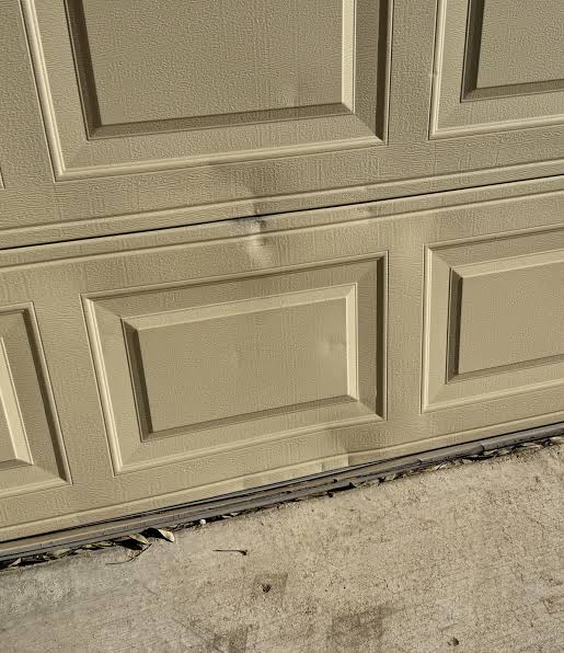 Can You Repair A Dent In A Garage Door