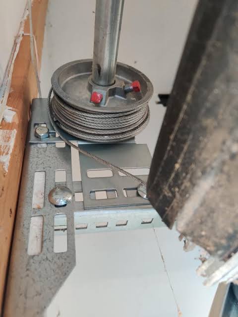 Garage Door Cable Loose On One Side When Open