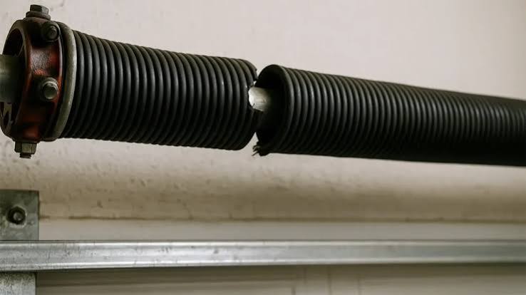 Garage Door Spring Broken On One Side How To Fix