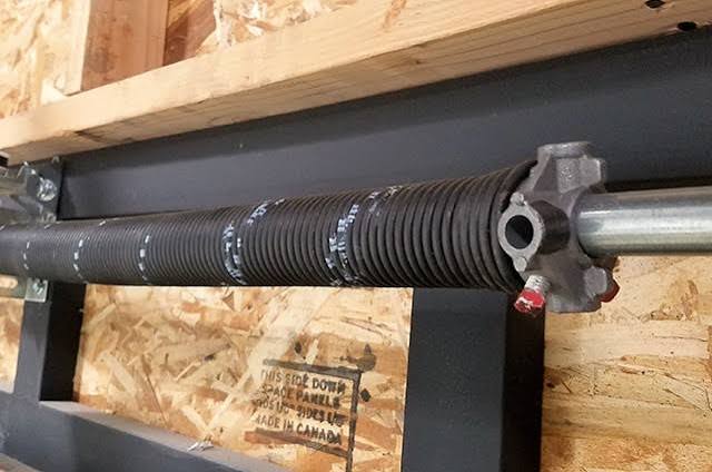How Do I Replace The Spring On My Garage Door