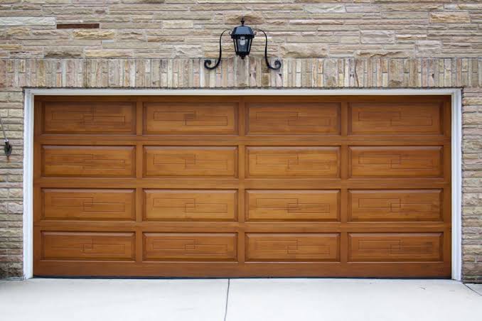 How Much Is A Panel For A Garage Door
