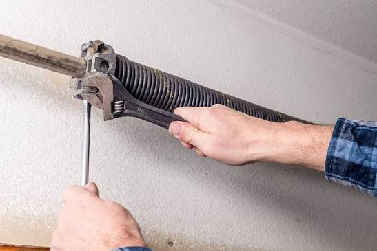 How Much Is It To Replace Spring On Garage Door