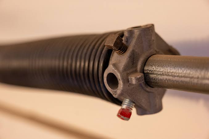 How Much To Fix A Broken Spring On Garage Door