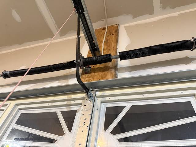 How Much To Fix A Spring On Garage Door