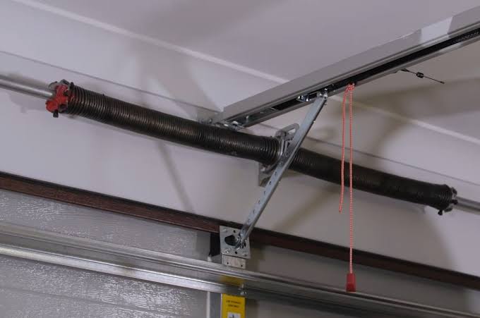 How To Adjust The Springs On A Garage Door
