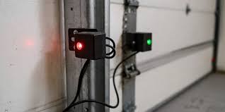 One Garage Door Sensor Is Yellow And One Is Green
