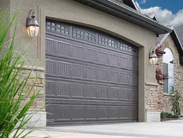 What Is The Cost Of Replacing A Garage Door