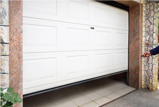 Why Does My Garage Door Close Then Open Back Up