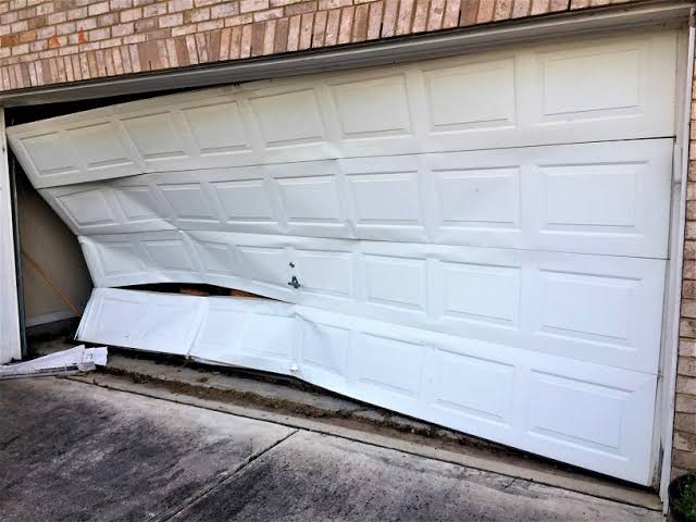 Why Is My Garage Door Bending In The Middle