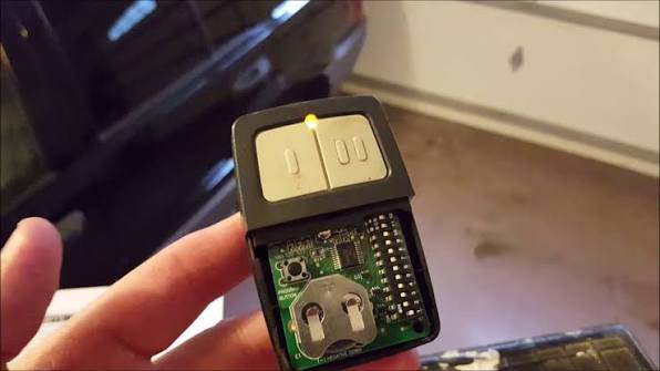 How Do You Program A Clicker Garage Door Opener Remote